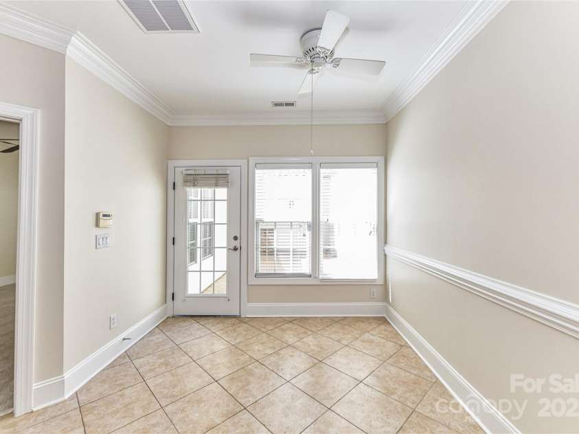 178 Harper Lee Street, Davidson, NC 28036.  MLS# CAR4232984, YatesRealty ID 14113. Breakfast area overlooking the private patio