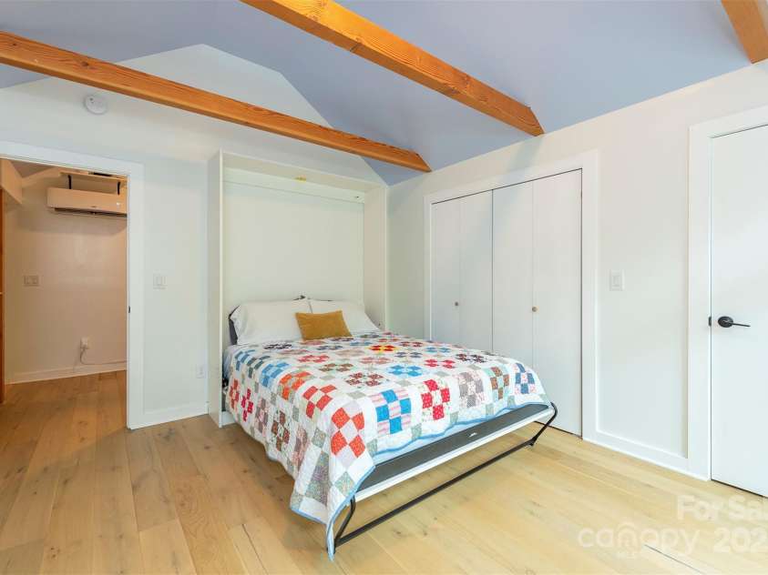 401 Winterle Road, Lake Lure, NC 28746.  MLS# CAR4254959, YatesRealty ID 14115. Convenient built-in Murphy bed to store away when not in use.