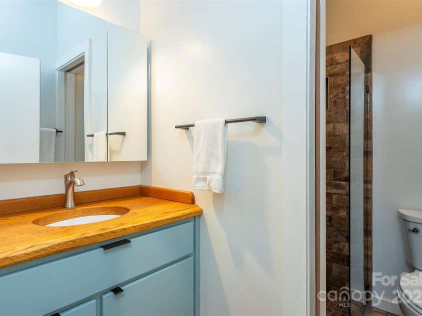 401 Winterle Road, Lake Lure, NC 28746.  MLS# CAR4254959, YatesRealty ID 14115. Main floor full bathroom.