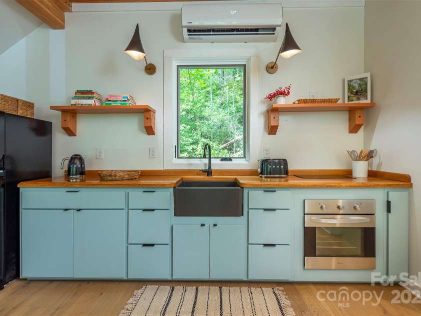 401 Winterle Road, Lake Lure, NC 28746.  MLS# CAR4254959, YatesRealty ID 14115. Wonderful combination of openness and warmth.