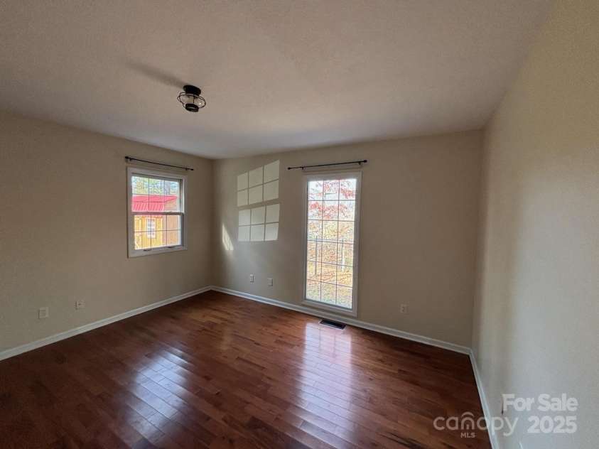 493 Spring Hill Road, Bakersville, NC 28705.  MLS# CAR4308372, YatesRealty ID 14115. Main bedroom