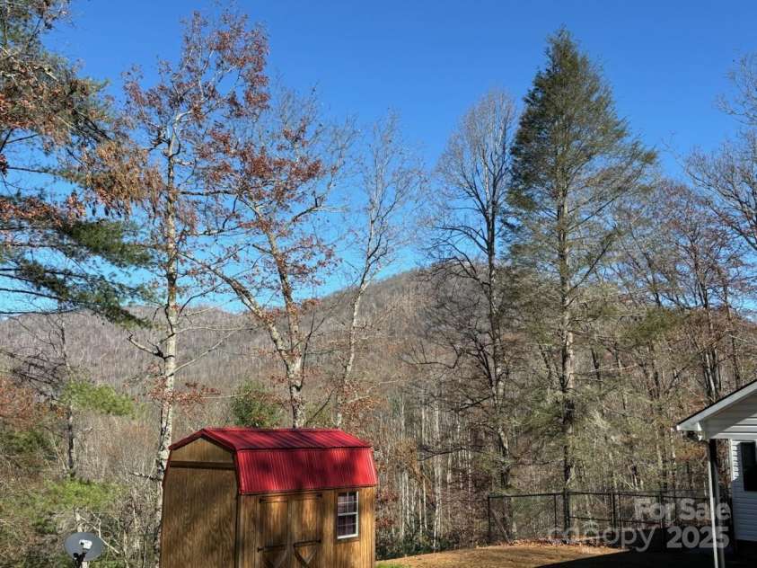 493 Spring Hill Road, Bakersville, NC 28705.  MLS# CAR4308372, YatesRealty ID 14115. New shed