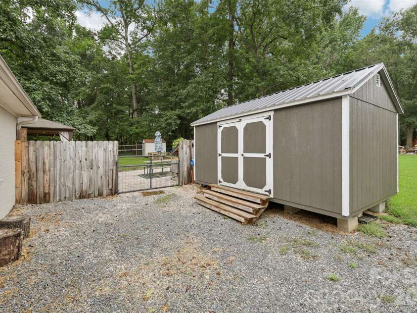 798 Pine Haven Circle, Clover, SC 29710.  MLS# CAR4359577, YatesRealty ID 14117. 16x20 Storage Shed