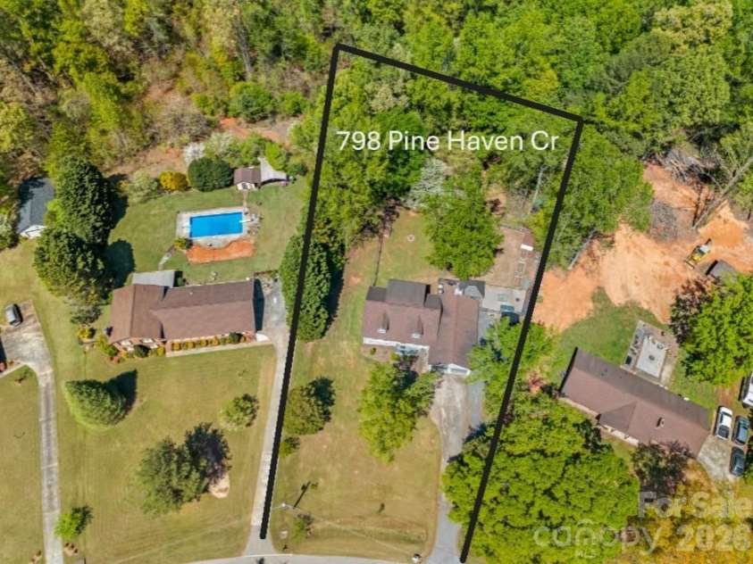 798 Pine Haven Circle, Clover, SC 29710.  MLS# CAR4359577, YatesRealty ID 14117. Aerial above the tree canopy