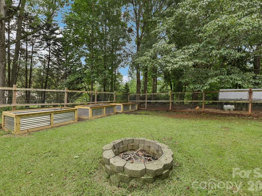798 Pine Haven Circle, Clover, SC 29710.  MLS# CAR4359577, YatesRealty ID 14117. Fire Pit to gather around