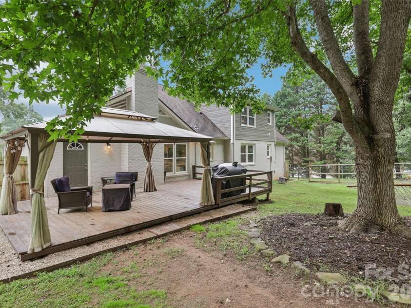 798 Pine Haven Circle, Clover, SC 29710.  MLS# CAR4359577, YatesRealty ID 14117. Rear yard, deck, Pergola