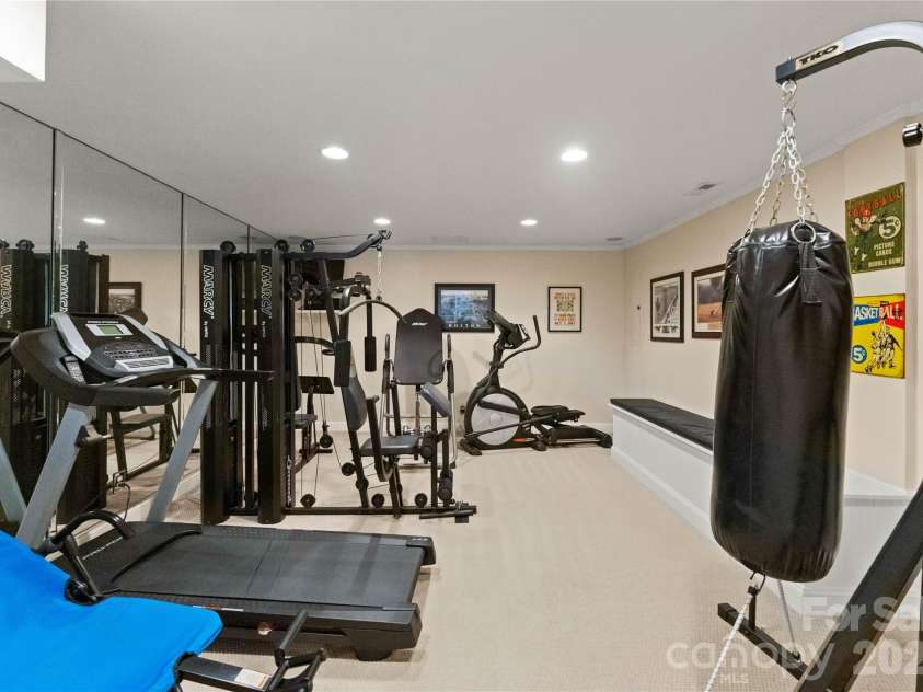 4708 Heatherton Place, Charlotte, NC 28270.  MLS# CAR4363271, YatesRealty ID 14119. Basement Exercise Room