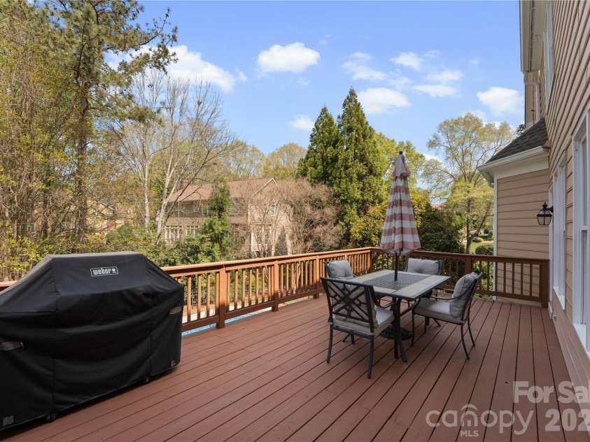 4708 Heatherton Place, Charlotte, NC 28270.  MLS# CAR4363271, YatesRealty ID 14119. Deck off Kitchen