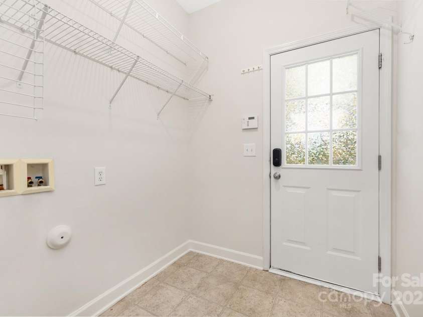 8206 Stourhead Gardens Lane, Waxhaw, NC 28173.  MLS# CAR4250920, YatesRealty ID 14120. Laundry room