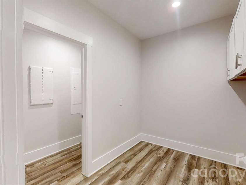 5345 Christopher Road, Iron Station, NC 28080.  MLS# CAR4357522, YatesRealty ID 14122. Large laundry room