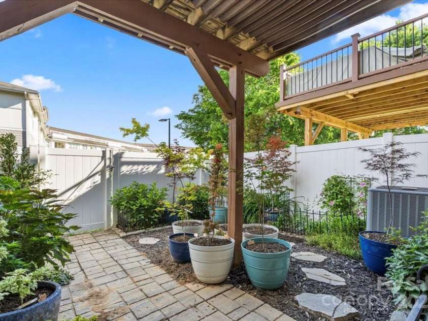 245 Rock Ridge Lane, Mount Holly, NC 28120.  MLS# CAR4255355, YatesRealty ID 14124. Private backyard