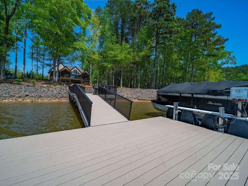 1579 Sunset Pointe Drive, Salisbury, NC 28146.  MLS# CAR4249912, YatesRealty ID 14126. 79' Dock with Trex Decking, Hydro-Hoist Boat Lift
