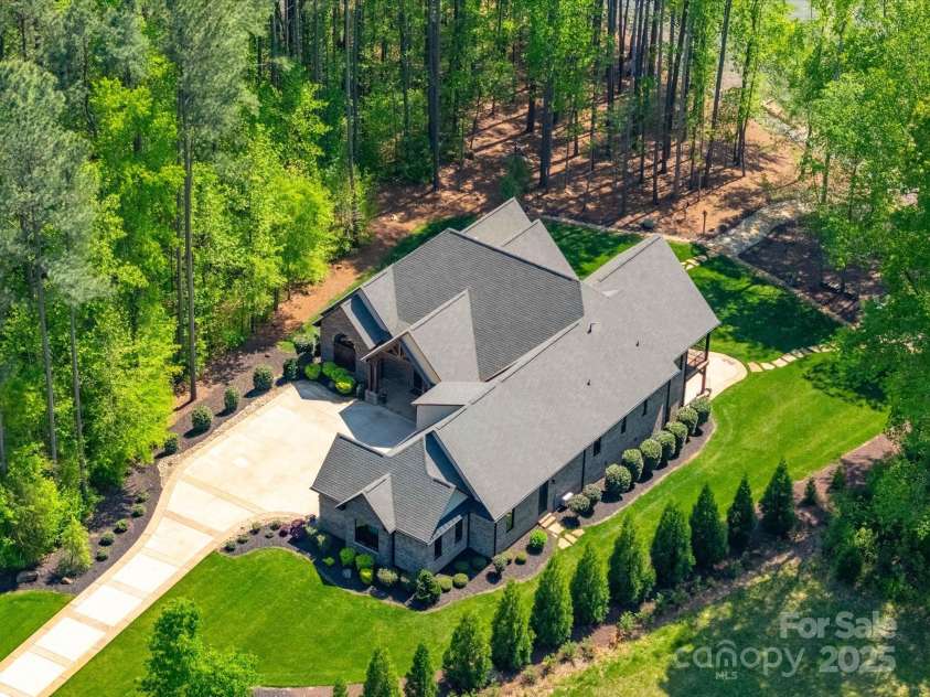 1579 Sunset Pointe Drive, Salisbury, NC 28146.  MLS# CAR4249912, YatesRealty ID 14126. Aerial view of home from right side