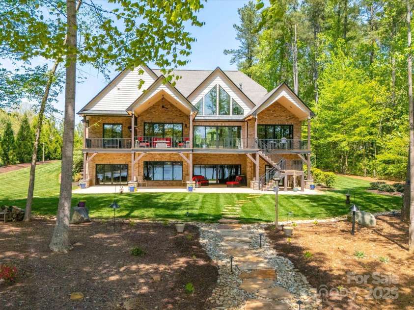 1579 Sunset Pointe Drive, Salisbury, NC 28146.  MLS# CAR4249912, YatesRealty ID 14126. View of back of home