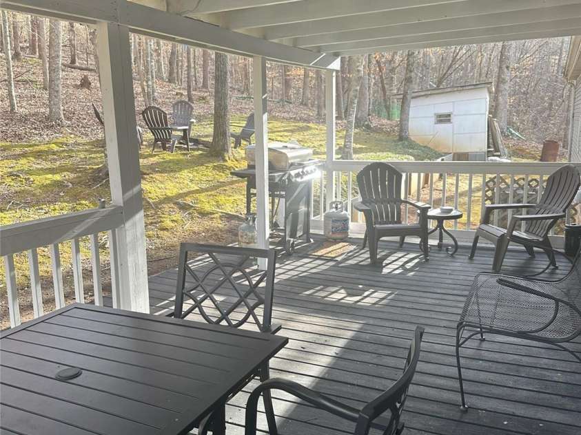 1597 Cleghorn Mill Road, Rutherfordton, NC 28139.  MLS# CAR4213254, YatesRealty ID 1413. Second covered porch on the back for grilling and relaxing. 