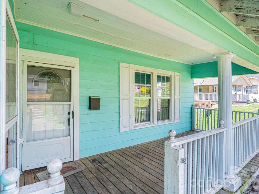 201 Newland Place, Lenoir, NC 28645.  MLS# CAR4359302, YatesRealty ID 14136. Covered Front Porch