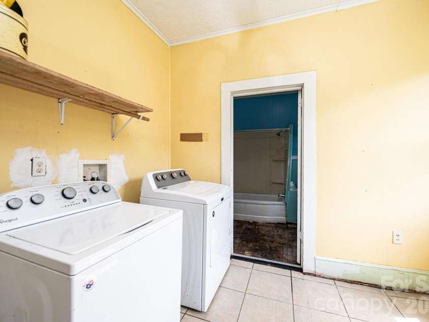 201 Newland Place, Lenoir, NC 28645.  MLS# CAR4359302, YatesRealty ID 14136. Laundry Room on main floor