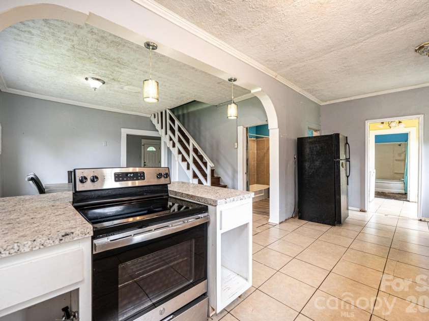 201 Newland Place, Lenoir, NC 28645.  MLS# CAR4359302, YatesRealty ID 14136. Open, bright kitchen