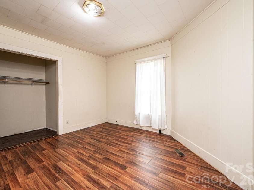 201 Newland Place, Lenoir, NC 28645.  MLS# CAR4359302, YatesRealty ID 14136. Primary Bed on main floor