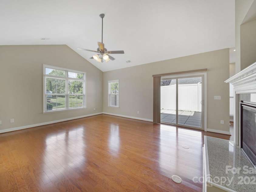 4919 Polo Gate Boulevard, Charlotte, NC 28216.  MLS# CAR4276719, YatesRealty ID 14140. Family Room