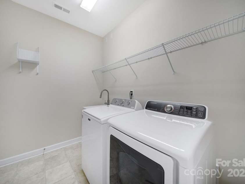 4919 Polo Gate Boulevard, Charlotte, NC 28216.  MLS# CAR4276719, YatesRealty ID 14140. Laundry Room