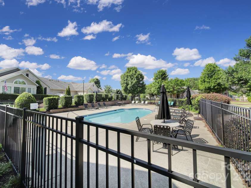 4919 Polo Gate Boulevard, Charlotte, NC 28216.  MLS# CAR4276719, YatesRealty ID 14140. Pool