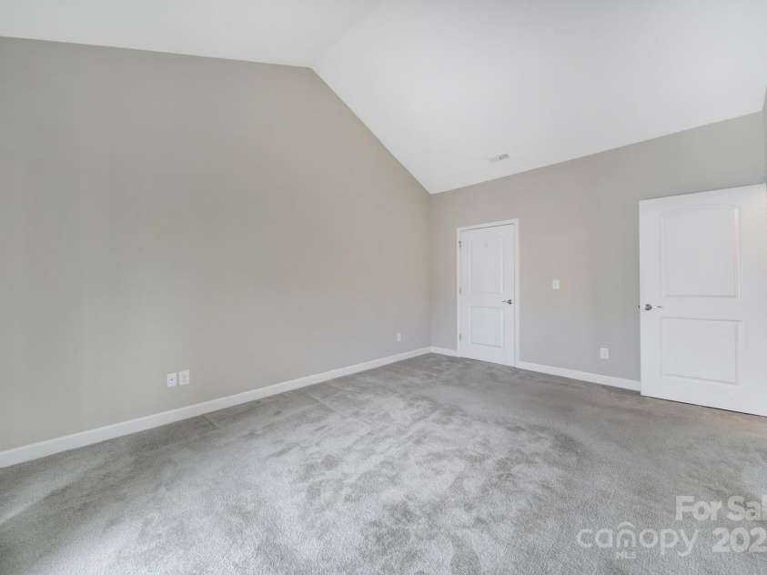 4919 Polo Gate Boulevard, Charlotte, NC 28216.  MLS# CAR4276719, YatesRealty ID 14140. Primary Bedroom