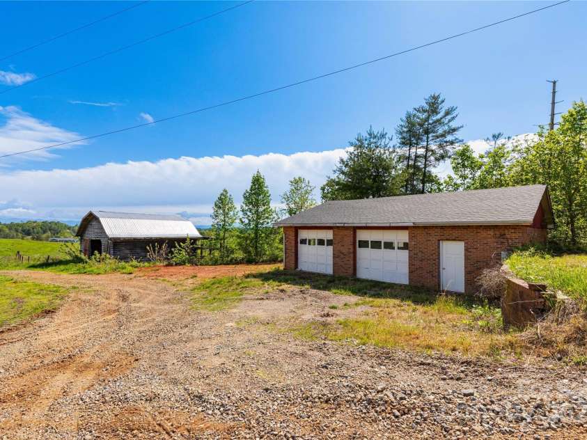 67 Old Turkey Creek Road, Leicester, NC 28748.  MLS# CAR4257740, YatesRealty ID 14147. Detached Garage