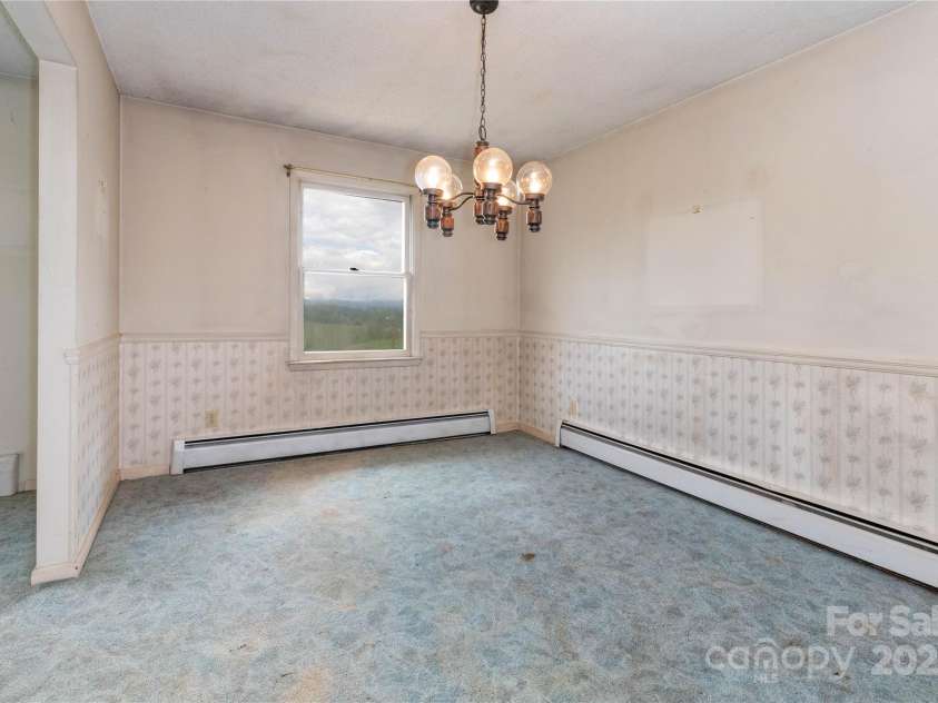 67 Old Turkey Creek Road, Leicester, NC 28748.  MLS# CAR4257740, YatesRealty ID 14147. Dining Room