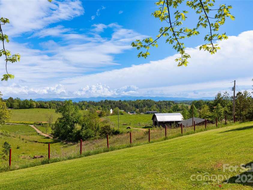 67 Old Turkey Creek Road, Leicester, NC 28748.  MLS# CAR4257740, YatesRealty ID 14147. Front Yard Mountain Views