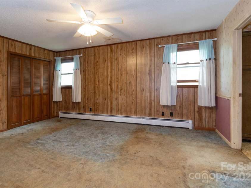 67 Old Turkey Creek Road, Leicester, NC 28748.  MLS# CAR4257740, YatesRealty ID 14147. Primary Bedroom