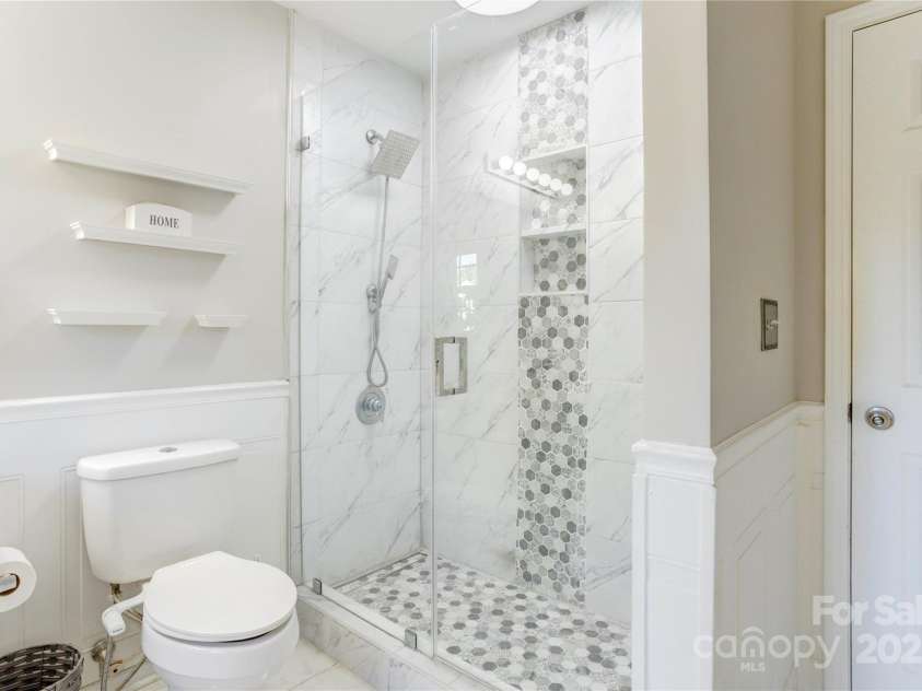 1229 Brecken Court, Kannapolis, NC 28081.  MLS# CAR4298369, YatesRealty ID 14150. Beautiful shower in hall bath