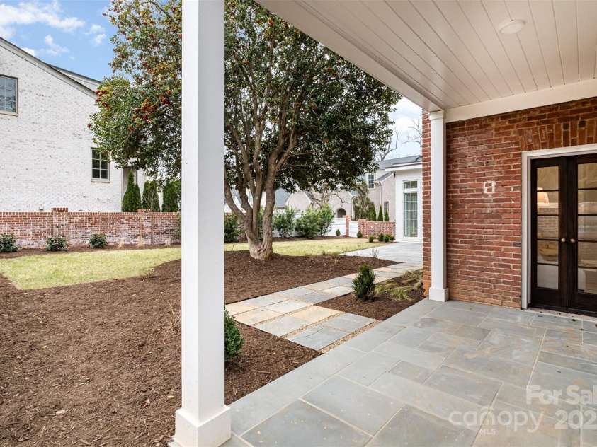 2400 Mecklenburg Avenue, Charlotte, NC 28205.  MLS# CAR4250989, YatesRealty ID 14152. Side porch