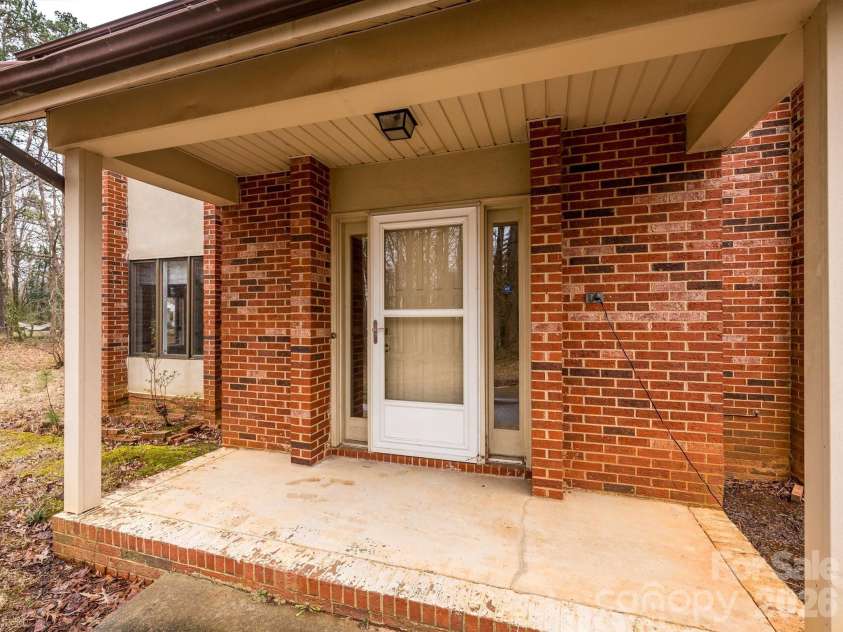 7600 Wallace Lane, Charlotte, NC 28212.  MLS# CAR4344455, YatesRealty ID 14152. Front Entrance
