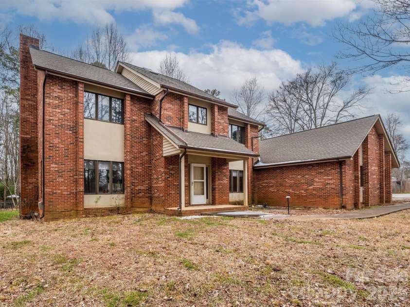 7600 Wallace Lane, Charlotte, NC 28212.  MLS# CAR4344455, YatesRealty ID 14152. Front Exterior