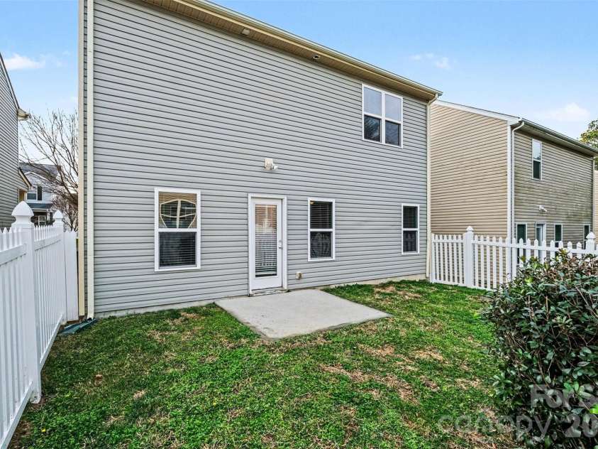 14311 Evening Flight Lane, Charlotte, NC 28262.  MLS# CAR4348964, YatesRealty ID 14156. Back patio 