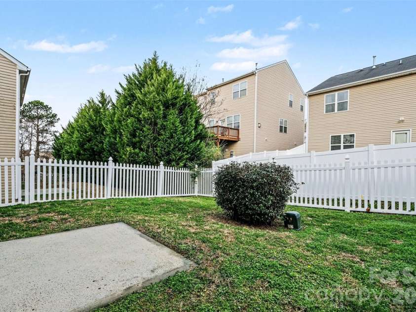 14311 Evening Flight Lane, Charlotte, NC 28262.  MLS# CAR4348964, YatesRealty ID 14156. Backyard