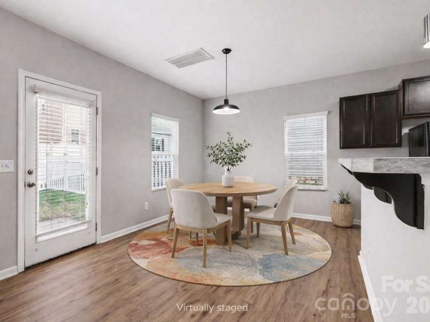 14311 Evening Flight Lane, Charlotte, NC 28262.  MLS# CAR4348964, YatesRealty ID 14156. Dining area virtually staged