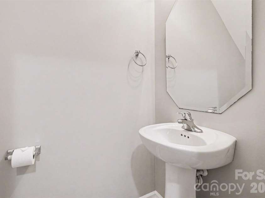 14311 Evening Flight Lane, Charlotte, NC 28262.  MLS# CAR4348964, YatesRealty ID 14156. Half bathroom