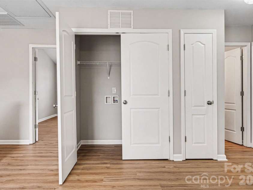 14311 Evening Flight Lane, Charlotte, NC 28262.  MLS# CAR4348964, YatesRealty ID 14156. Laundry closet upstairs