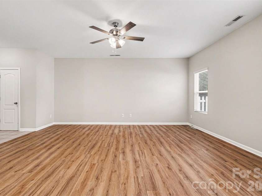 14311 Evening Flight Lane, Charlotte, NC 28262.  MLS# CAR4348964, YatesRealty ID 14156. Living room 