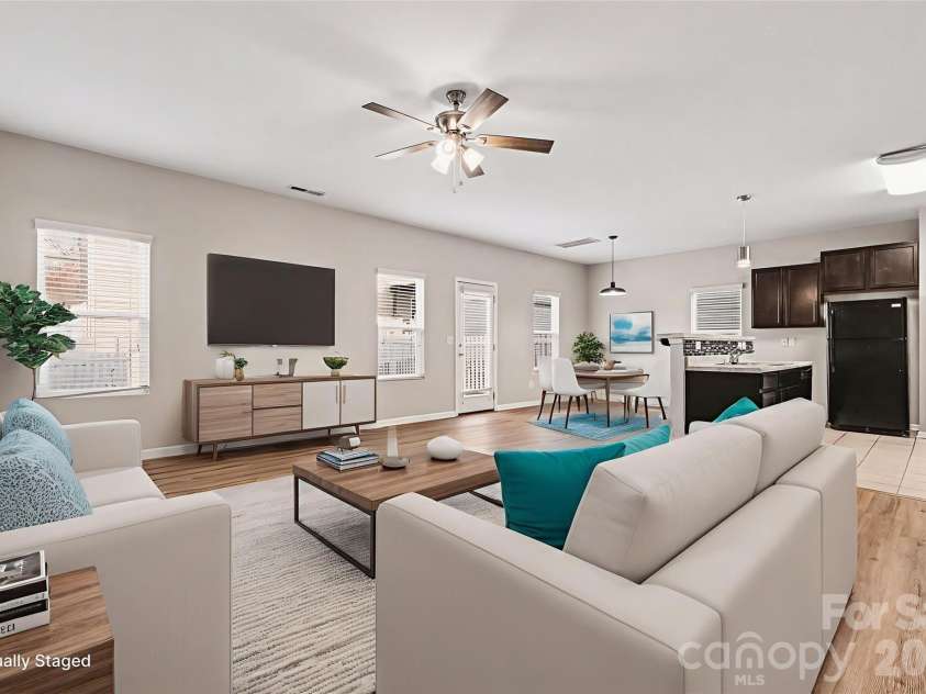 14311 Evening Flight Lane, Charlotte, NC 28262.  MLS# CAR4348964, YatesRealty ID 14156. Living room virtually staged