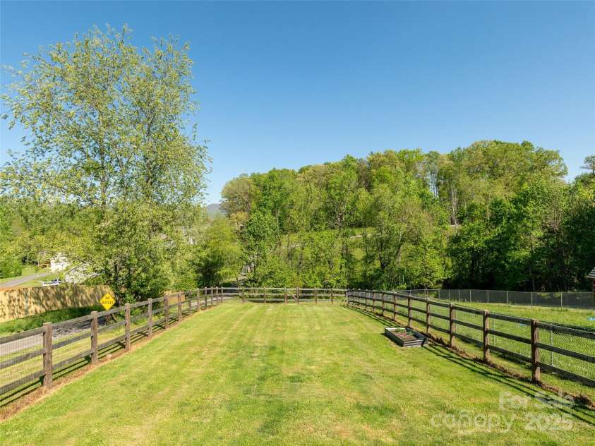 734 Enka Lake Road, Candler, NC 28715.  MLS# CAR4252747, YatesRealty ID 14156. 