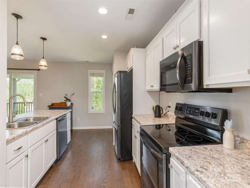 734 Enka Lake Road, Candler, NC 28715.  MLS# CAR4252747, YatesRealty ID 14156. 