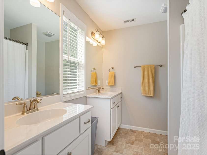 734 Enka Lake Road, Candler, NC 28715.  MLS# CAR4252747, YatesRealty ID 14156. 