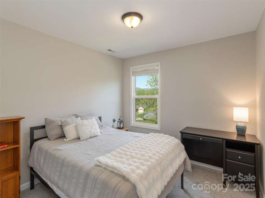 734 Enka Lake Road, Candler, NC 28715.  MLS# CAR4252747, YatesRealty ID 14156. 