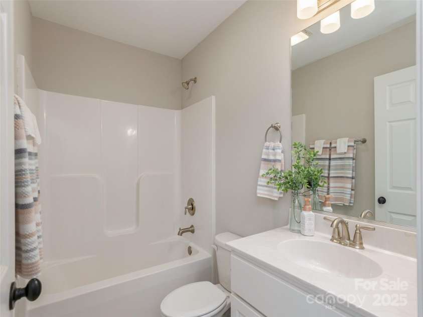 734 Enka Lake Road, Candler, NC 28715.  MLS# CAR4252747, YatesRealty ID 14156. 