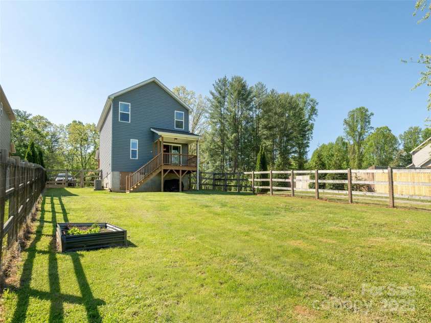 734 Enka Lake Road, Candler, NC 28715.  MLS# CAR4252747, YatesRealty ID 14156. 