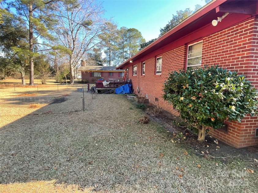 202 Marcellus Street, Laurinburg, NC 28352.  MLS# CAR4248496, YatesRealty ID 14157. Back Of Home