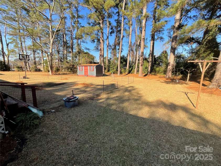 202 Marcellus Street, Laurinburg, NC 28352.  MLS# CAR4248496, YatesRealty ID 14157. Backyard